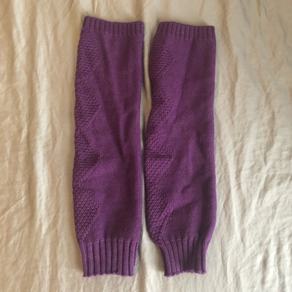 Purple leg warmers. Normal wear and tear